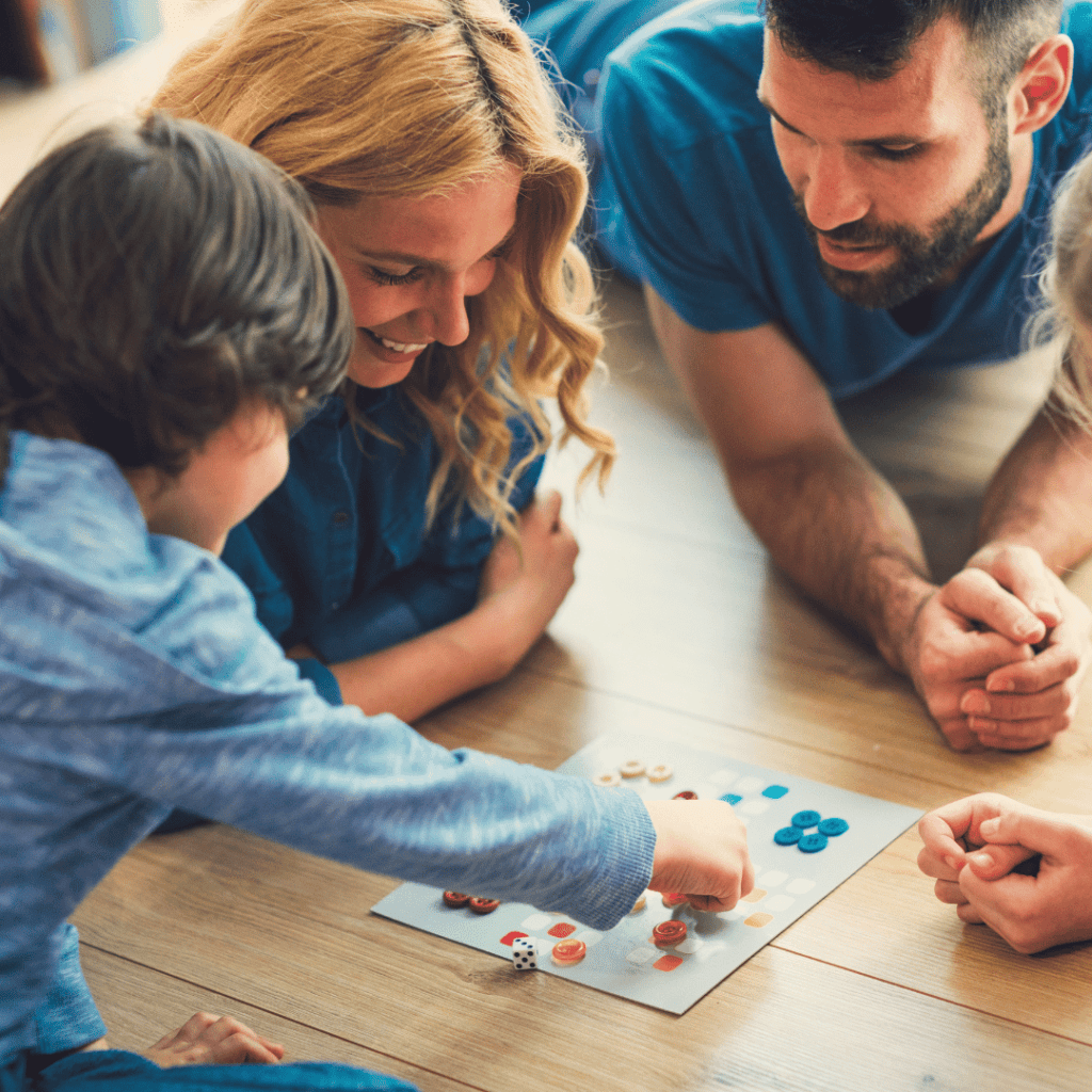 family playing a board game.